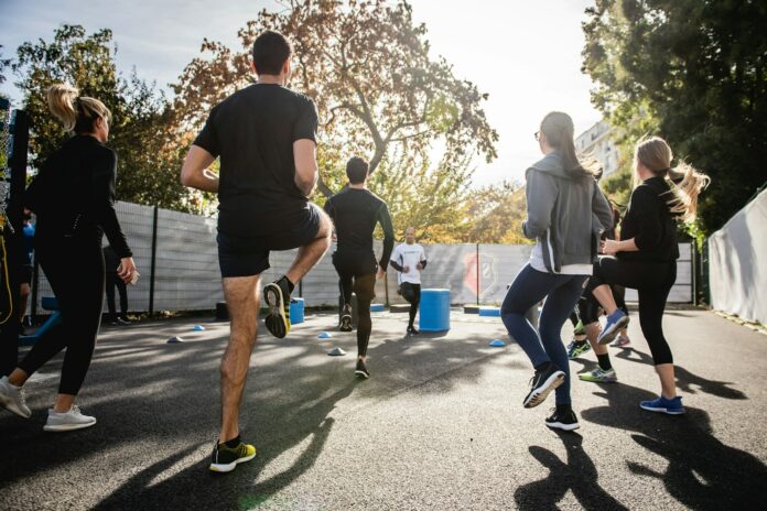 Photo by Gabin Vallet man in black t-shirt and black shorts running on road during daytime