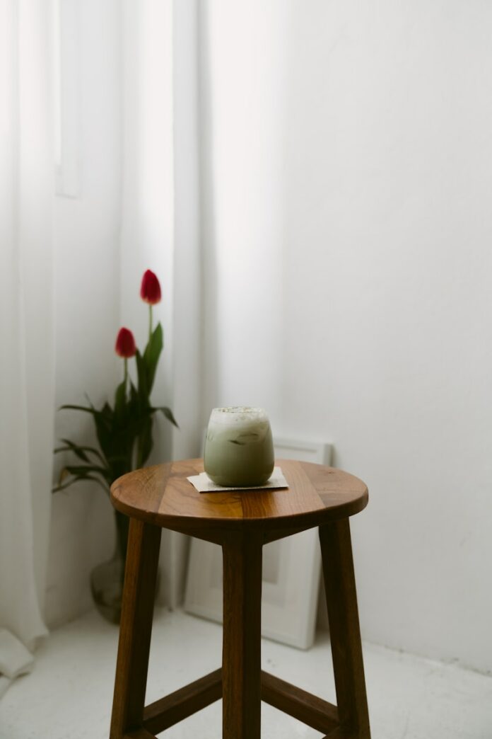 Photo by SiravitPlug round brown wooden stool