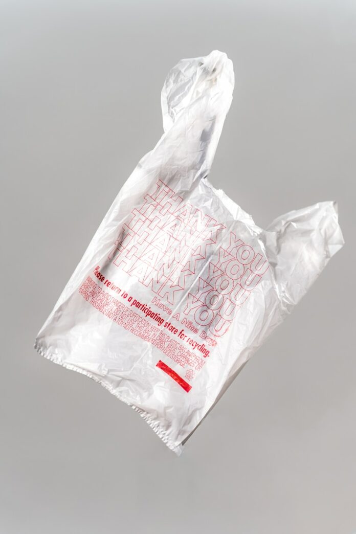 Photo by Christopher Vega white plastic bag on white table