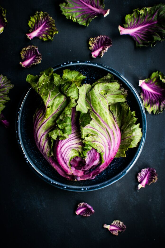 Photo by Monika Grabkowska purple and green vegetable in black bowl